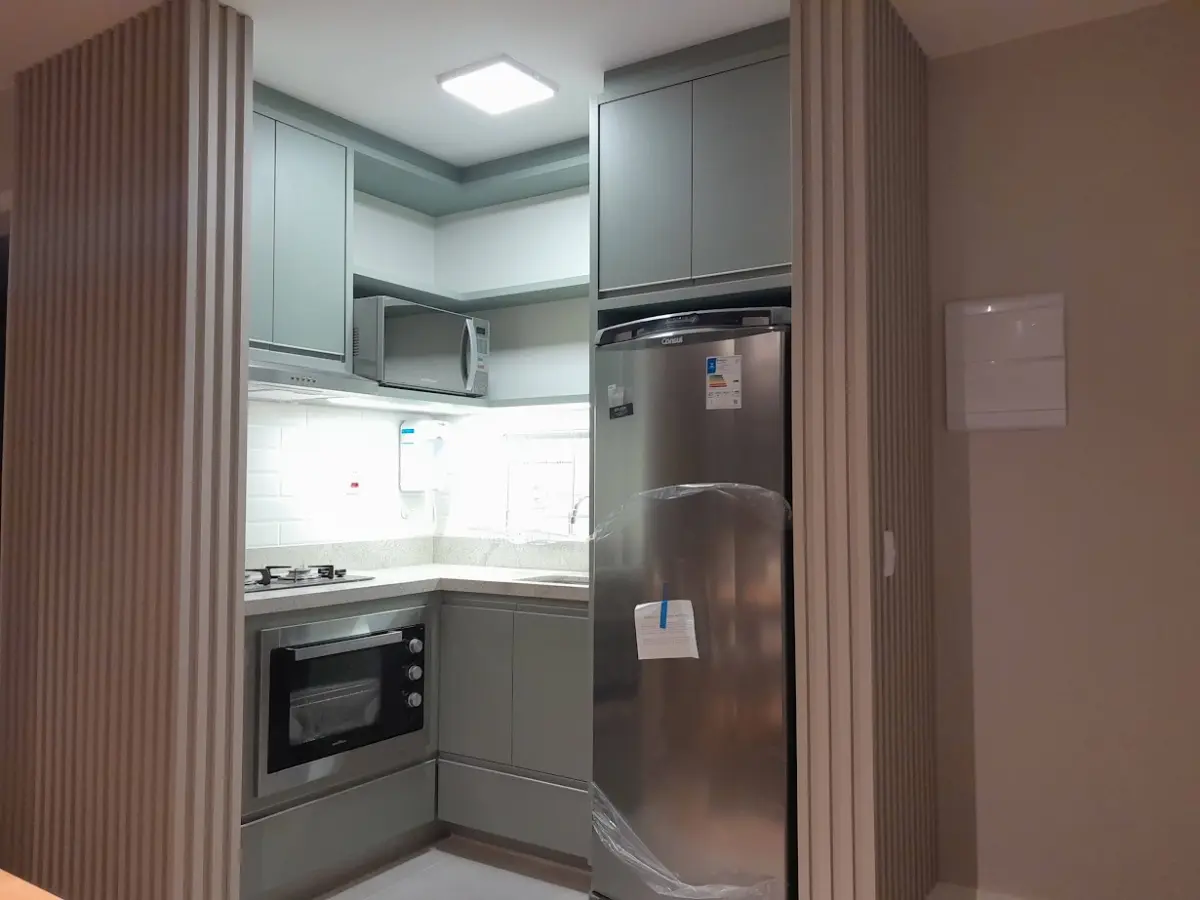 Cozinha compacta e funcional em MDF Verde Jade em São João da Boa Vista